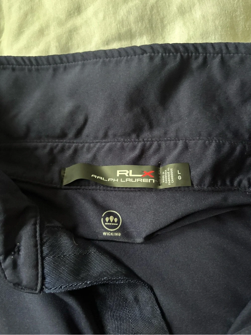 Ralph Lauren RLX Navy Polo with Orange Embroidered PGA Logo